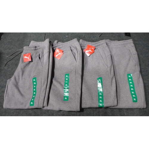 3172 - Four pairs of Men's Grey Puma joggers - Size: XL *This lot is subject to VAT