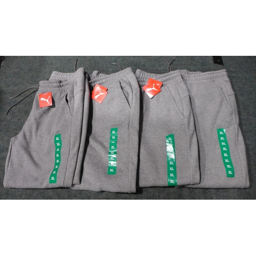 3173 - Four pairs of Men's Grey Puma joggers - Size: XL *This lot is subject to VAT