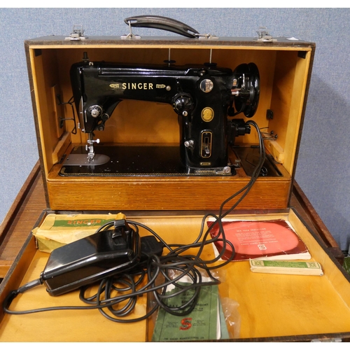 415 - A cased Singer electric sewing machine