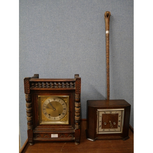 420 - A late 19th century German walnut mantel clock, an Art Deco oak mantel clock and a walking cane