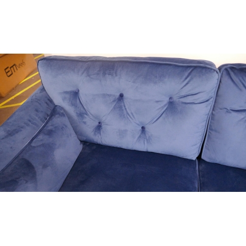 1398 - A blue velvet Hoxton three seater sofa RRP £799