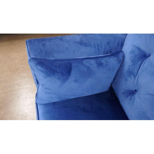 1398 - A blue velvet Hoxton three seater sofa RRP £799