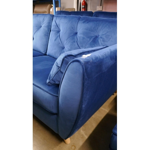 1398 - A blue velvet Hoxton three seater sofa RRP £799