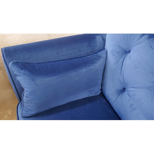 1398 - A blue velvet Hoxton three seater sofa RRP £799