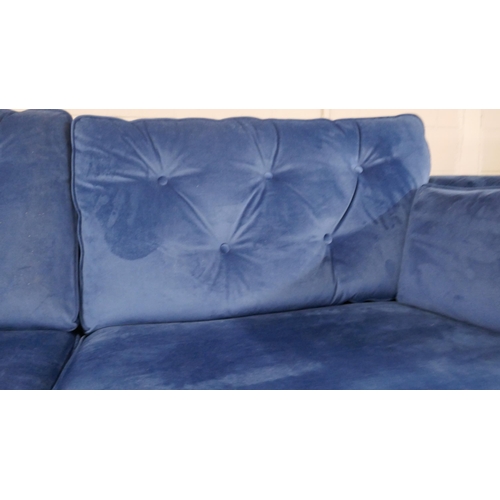 1399 - A blue velvet Hoxton three seater sofa RRP £799