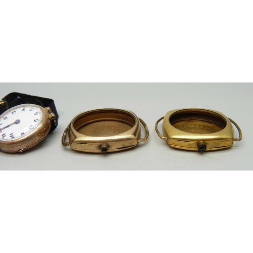 1001 - A lady's 9ct gold  wristwatch and two gold plated watch cases