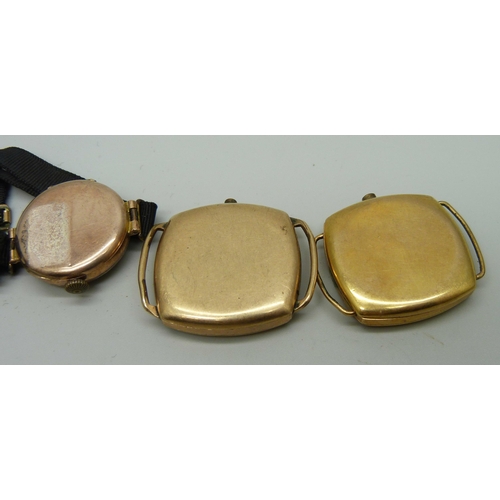 1001 - A lady's 9ct gold  wristwatch and two gold plated watch cases