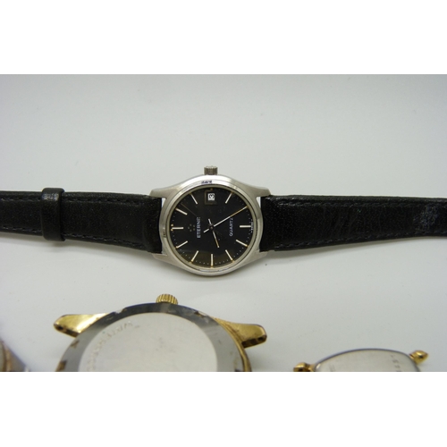 1003 - Two Longines automatic wristwatches, a watch case and a lady's Eterna quartz wristwatch