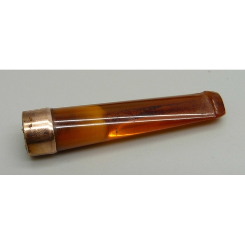 1010 - A cheroot holder with a 9ct gold mount, cased, case a/f