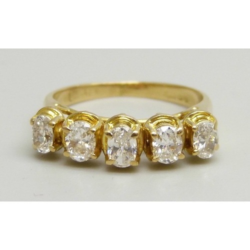 1022 - An 18ct yellow gold ring set with five oval brilliant cut diamonds, G clarity, 3g, I