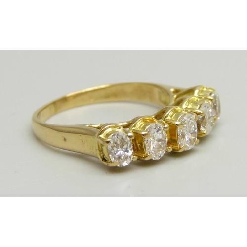 1022 - An 18ct yellow gold ring set with five oval brilliant cut diamonds, G clarity, 3g, I