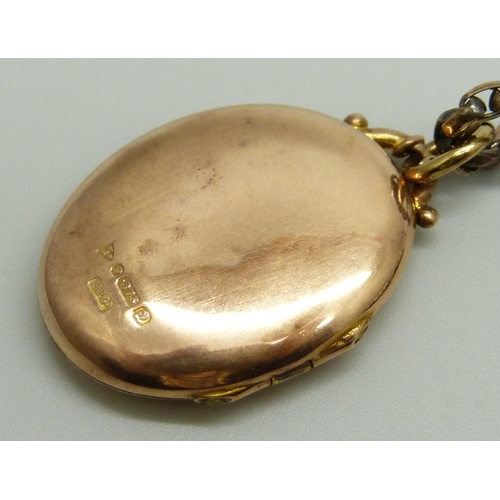 1025 - A 9ct gold engraved design locket, 4.4g, on an unmarked yellow metal faceted oval belcher chain neck... 