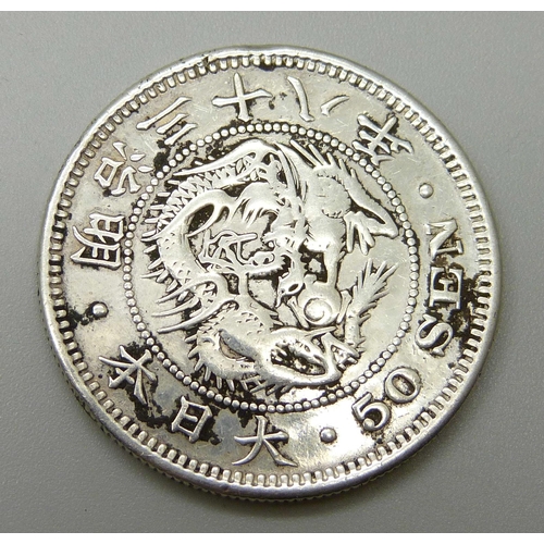 1029 - A Chinese silver 50 Sen coin