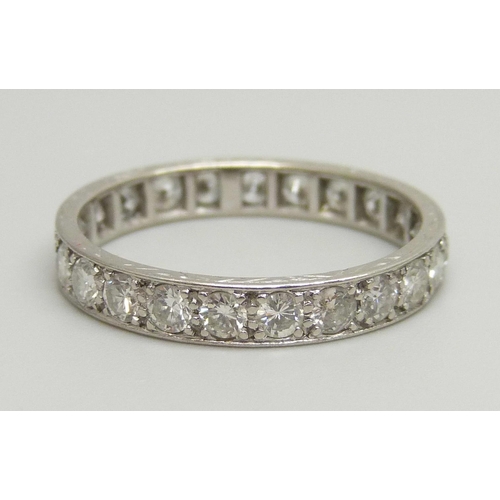 1031 - A white metal eternity ring set with approximately 2ct of diamonds, 3.2g, P