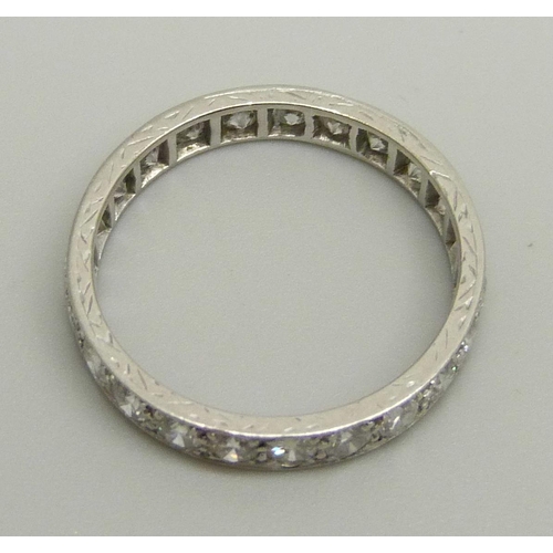 1031 - A white metal eternity ring set with approximately 2ct of diamonds, 3.2g, P