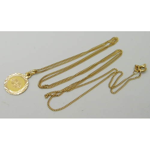 1036 - A yellow metal pendant with Arabic engraving (tests as 18ct gold), on an 18ct yellow gold fine curb ... 