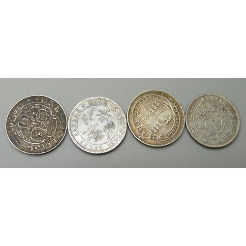 1053 - Coins; two Hong Kong 20 cents, 1894 and 1895, both 800 silver, and two shillings, 1895 and 1897