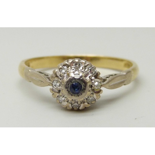 1054 - An 18ct gold, sapphire and diamond cluster ring, 2.8g, M/N