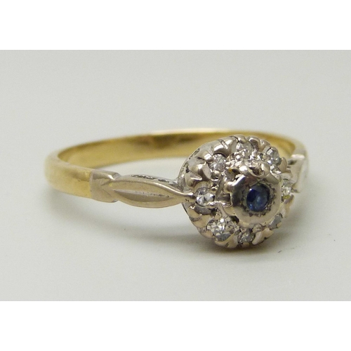 1054 - An 18ct gold, sapphire and diamond cluster ring, 2.8g, M/N