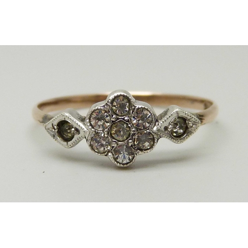 1057 - A 9ct gold and silver vintage paste cluster ring, P