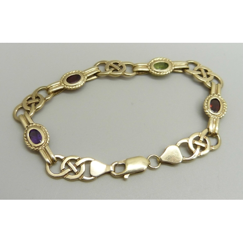 1063 - A Celtic style 9ct gold multi-gem bracelet, 11.9g