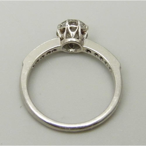 1075 - A platinum and brilliant cut diamond ring, diamond measuring 5.35mm in diameter, approximately 0.526... 