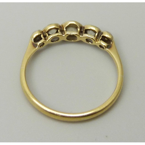 1079 - An 18ct gold and five stone diamond ring, all stones old cut, centre stone measures approximately 3.... 