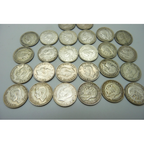 1093 - Coins; a collection of shillings, 1926 to 1951 inclusive, (26 coins), 146.4g