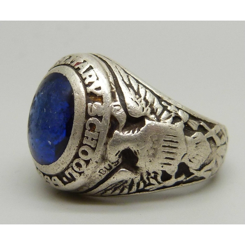 1100 - A sterling graduation ring, Kemper Military School, set with a blue stone, P, stone a/f