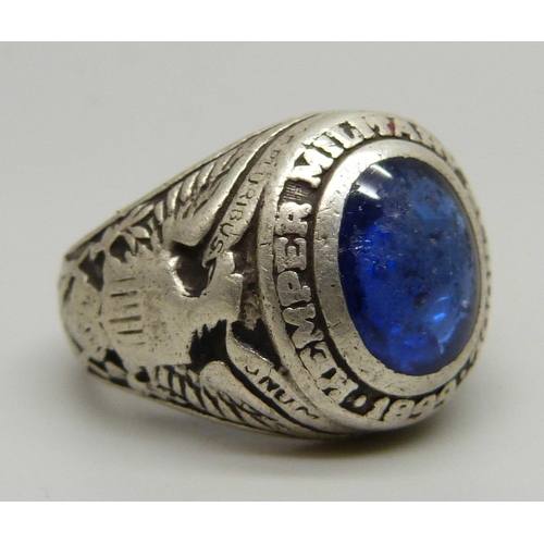 1100 - A sterling graduation ring, Kemper Military School, set with a blue stone, P, stone a/f