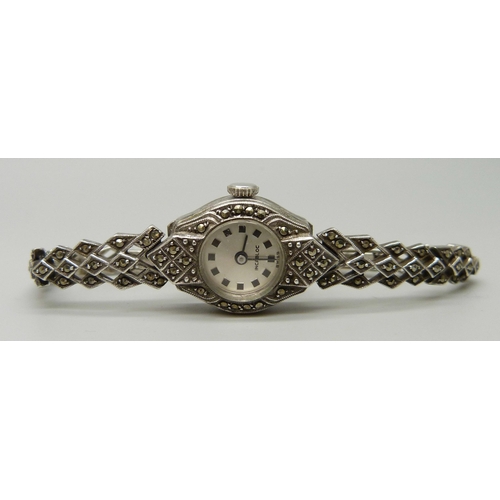 1101 - A lady's silver and marcasite set cocktail wristwatch