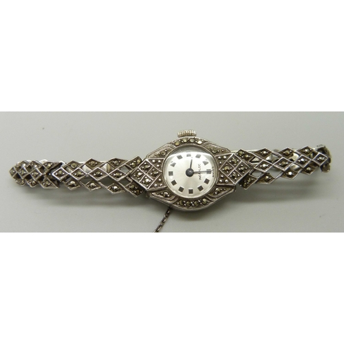 1101 - A lady's silver and marcasite set cocktail wristwatch