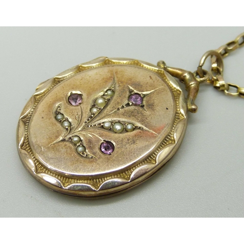 1102 - A yellow metal, amethyst and pearl locket on a 9ct gold chain, total weight 8.4g, chain 39cm, locket... 