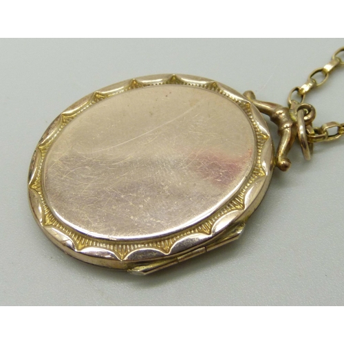 1102 - A yellow metal, amethyst and pearl locket on a 9ct gold chain, total weight 8.4g, chain 39cm, locket... 