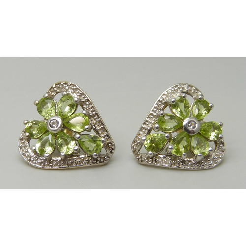 1109 - A pair of silver gilt, peridot and white topaz earrings