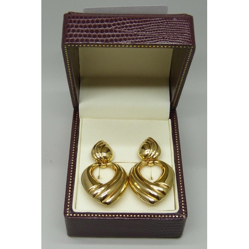 1111 - A pair of 9ct gold Unoaerere designer earrings, 6.1g