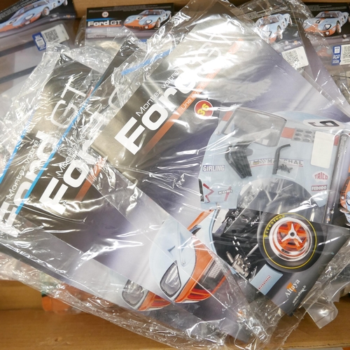 1225 - A quantity of DeAgostini build your own Ford GT40 sealed parts **PLEASE NOTE THIS LOT IS NOT ELIGIBL... 