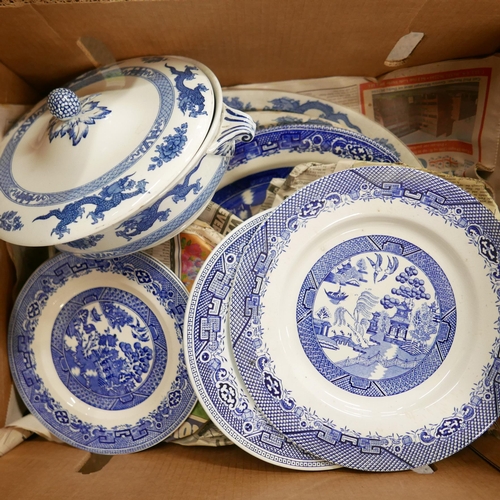 1239 - A collection of blue and white dinnerwares including Meakin and Booths, with three larger serving pl... 