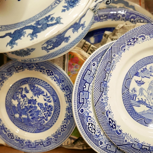 1239 - A collection of blue and white dinnerwares including Meakin and Booths, with three larger serving pl... 