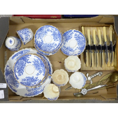 1242 - Blue and white teaware, flatware, four letter openers, etc. **PLEASE NOTE THIS LOT IS NOT ELIGIBLE F... 