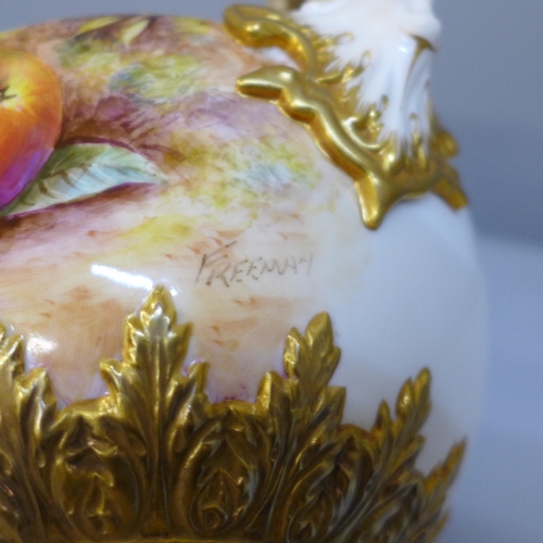 614 - A Royal Worcester hand painted angel head vase and cover decorated with fruit, signed Freeman, 27cm