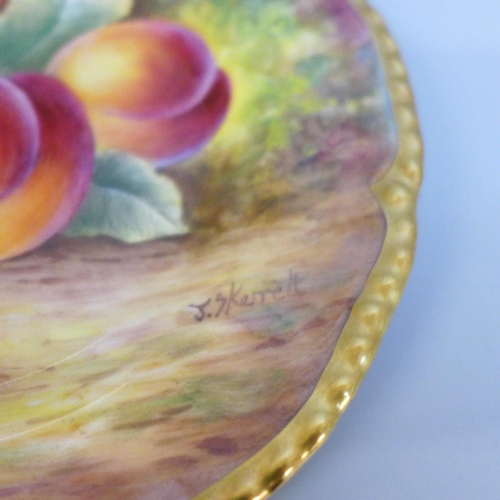 615 - A set of three graduated Royal Worcester hand painted cabinet plates, decorated with fruit, signed J... 