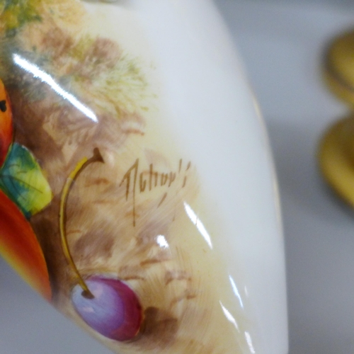 635 - A pair of Royal Worcester hand painted vases and covers, decorated with fruit, signed, one vase and ... 