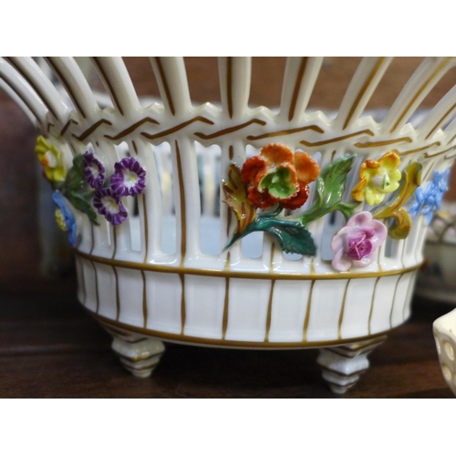 656 - A Royal Worcester porcelain nautilus vase, 17cm, three Royal Creamware baskets and two Dresden pierc... 