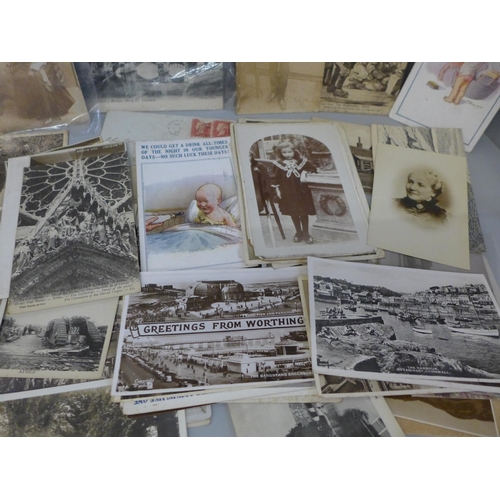 658 - A collection of approximately 60 postcards and letters including photographic WWI military and other... 