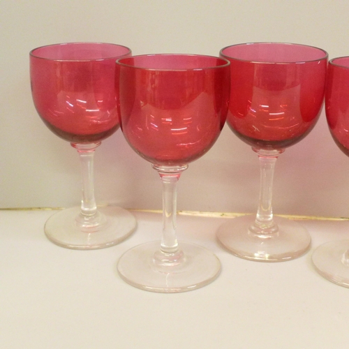 666 - A set of six cranberry wine glasses