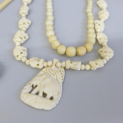 669 - A collection of bone and faux ivory jewellery