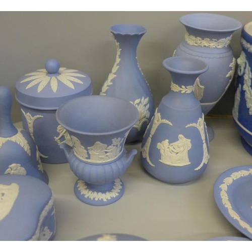 674 - A box of approximately 20 items of Wedgwood Jasperware including a jardiniere, jug, vases, lidded po... 