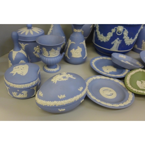 674 - A box of approximately 20 items of Wedgwood Jasperware including a jardiniere, jug, vases, lidded po... 