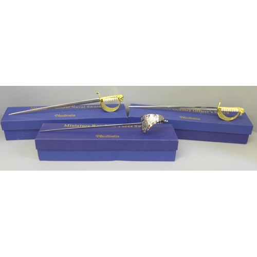 682 - Three Nauticalia Miniature Royal Navy swords, 29cm, boxed